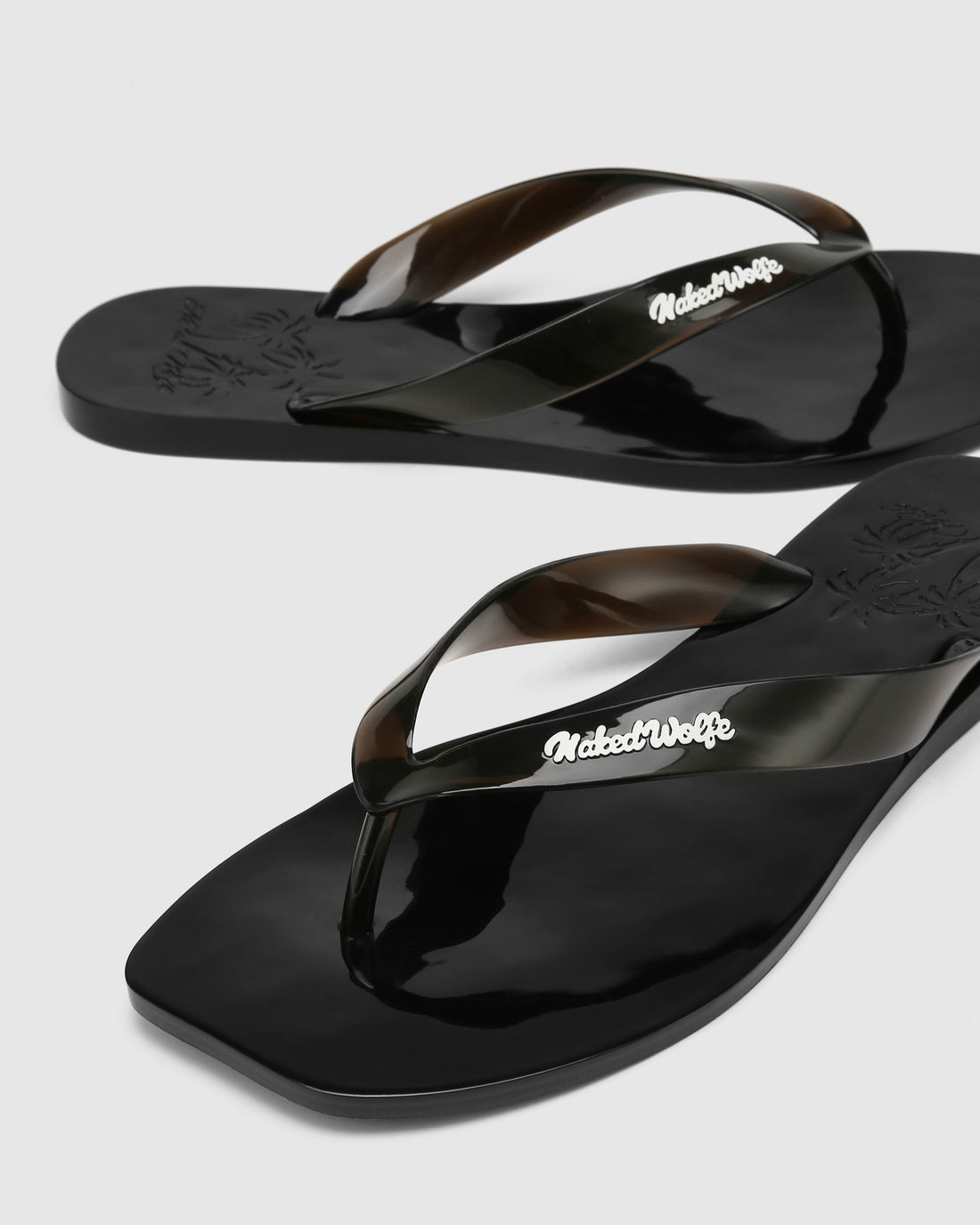 The Surfing Thong Black Jelly