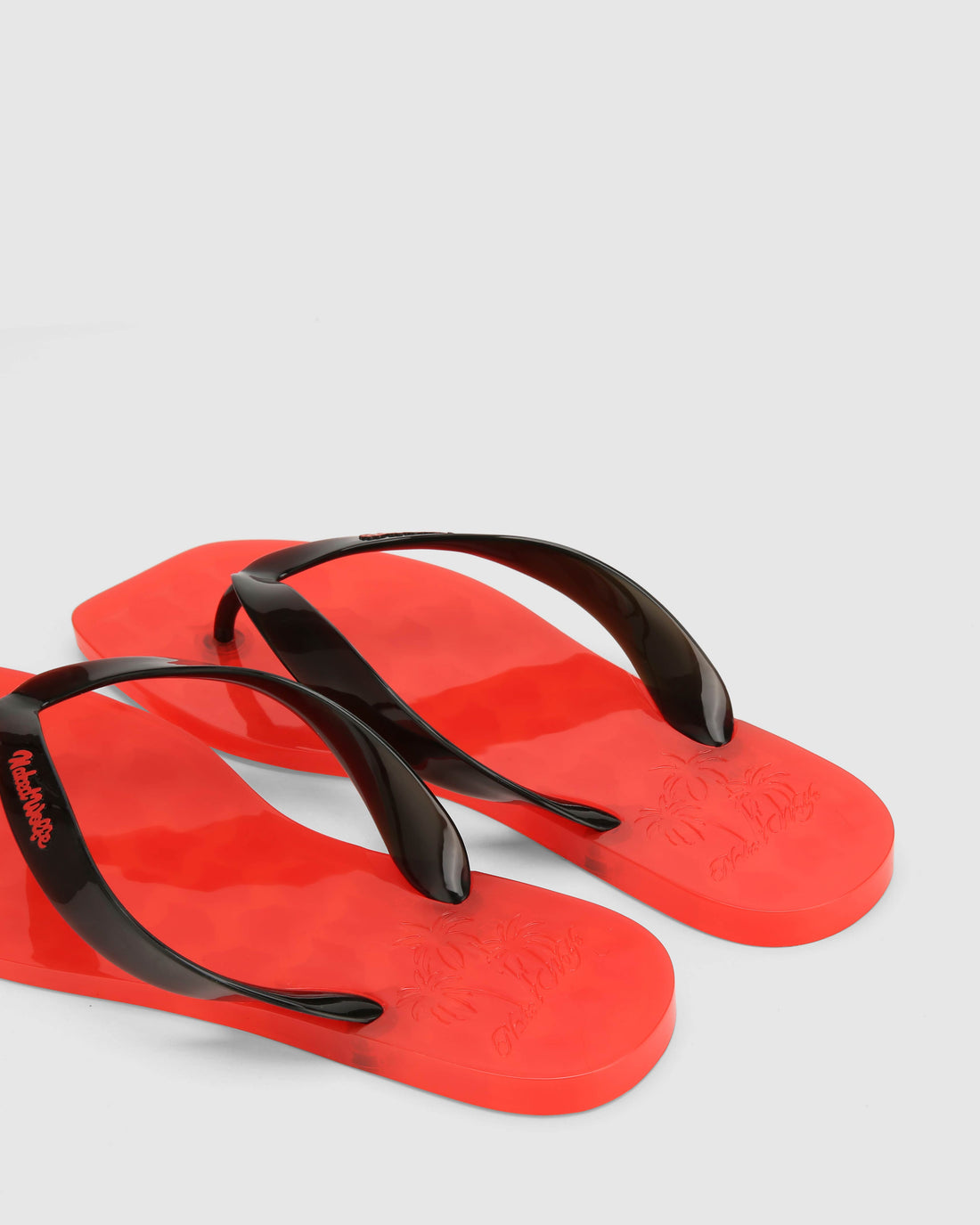 The Surfing Thong Black/Red Jelly