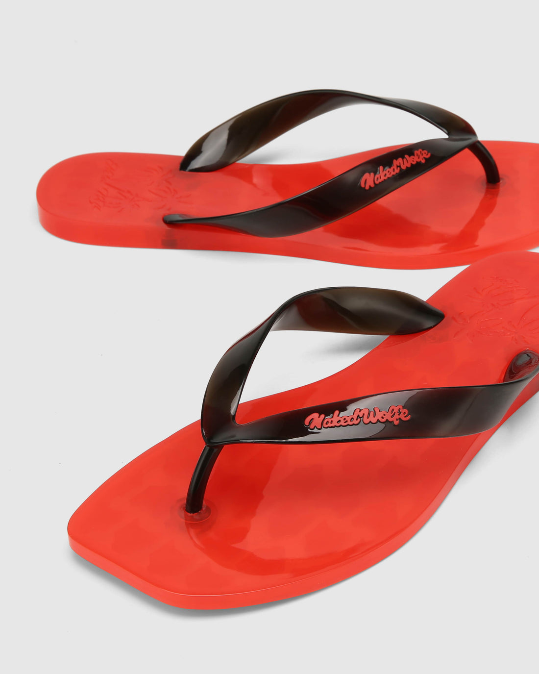 The Surfing Thong Black/Red Jelly